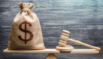 Bag,Of,Money,With,A,Dollar,Sign,And,A,Judge's