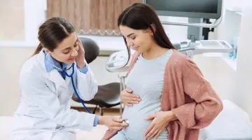 Female,Gynecologist,Working,With,Pregnant,Woman,In,Clinic