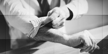 Businessman,Rolling,Up,His,Sleeves,,Concept,Of,Motivation,,Geometric,Pattern