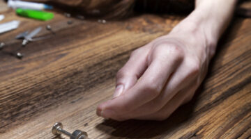 Young,Woman,Poses,As,An,Unconscious,Drug,Addict,,Concept,Photo.